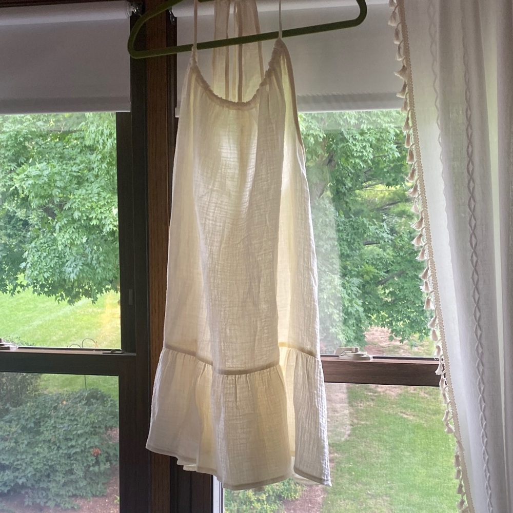 Cream Sleeveless Ruffle Hem Dress